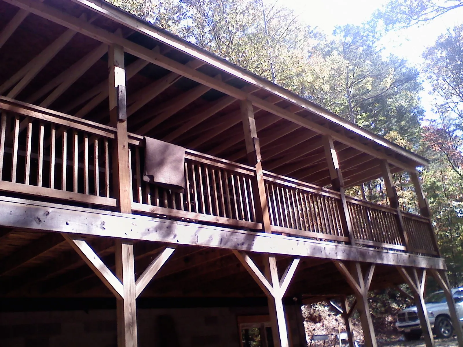 Timber framing under a new elevated porch and deck — Roof Leak Repair in Duquesne by Roofing Brothers